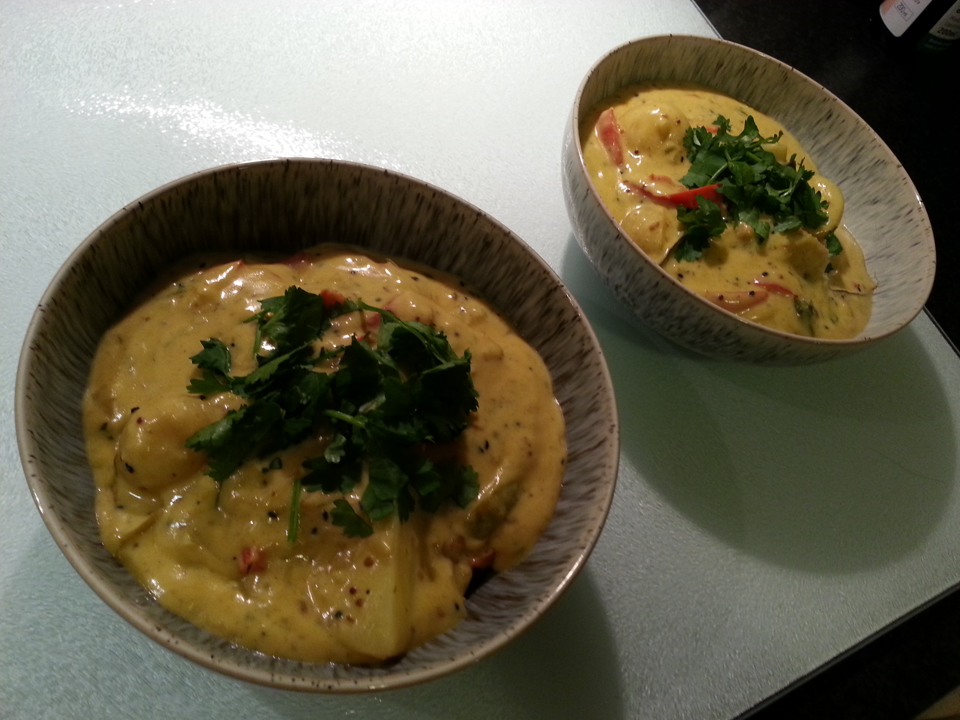 Kadi - A curry made with yoghurt, vegetables and Pakoras